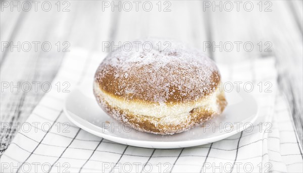 Berliner Doughnuts (fresh made) as detailed close-up shot, selective focus