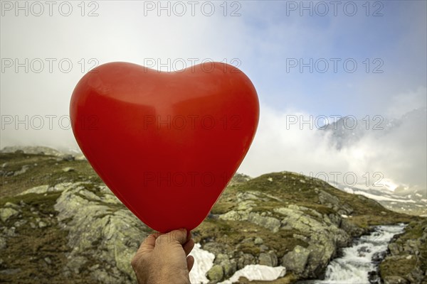 Balloon heart in the Alps