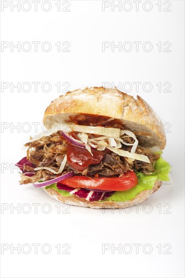 Pulled pork in a bun on white