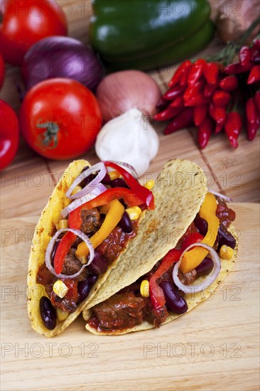 Tortilla filled with beans and meat sauce