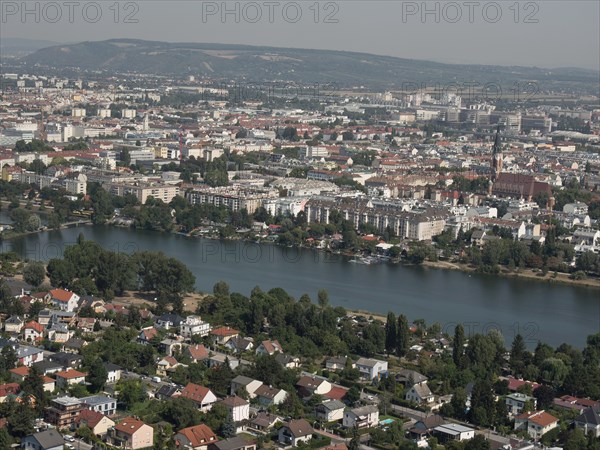 View of a city with many houses and a river, surrounded by hills, Vienna, Austria, Europe
