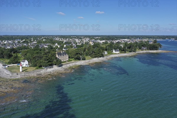 Aerial view coast of Loctudy with villas and lighthouse Phare de Langoz, department Finistere Penn ar Bed, region Bretagne Breizh, France, Europe