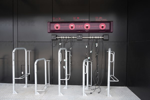 Electric bicycle recharging battery station, eco power and environment, green sustainable energy, Wasserbillig in Luxembourg, 17.03.2024