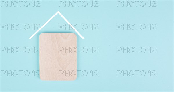 Wooden house with a roof, planning to build or rent a new home, real estate, owning property