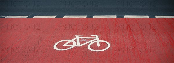 Road with a bicycle path in the city, eco friendly lifestyle, reduce co2 emission footprint