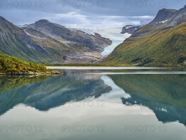 Svartisen glacier, Helgeland coast, reflection in Holandsfjord, autumn, Nordland, Saltfjellet-Svartisen National Park, Norway, Europe
