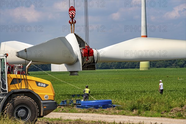 Repowering of a wind farm near Issum, 9 older wind turbines from the manufacturer Enercon (model series E-58) will be dismantled, which have been in operation for over two decades, will be replaced by a total of four Enercon E-160 turbines, under construction, with a total output of 22 megawatts, Lower Rhine, North Rhine-Westphalia, Germany, Europe