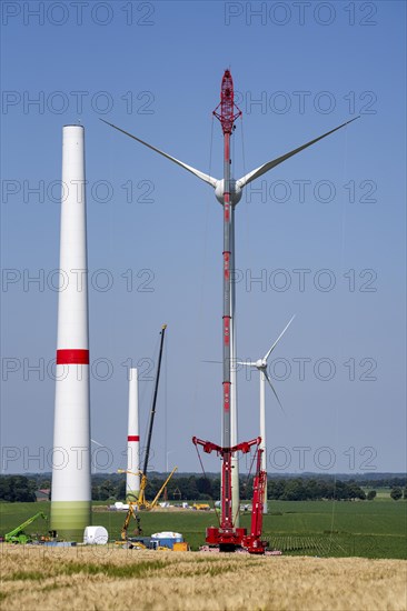 Repowering of a wind farm near Issum, 9 older wind turbines from the manufacturer Enercon (model series E-58) will be dismantled, which have been in operation for over two decades, will be replaced by a total of four Enercon E-160 turbines, under construction, with a total output of 22 megawatts, Lower Rhine, North Rhine-Westphalia, Germany, Europe