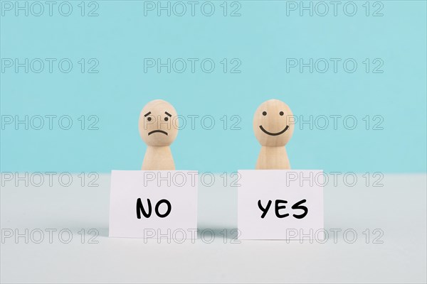 Men holding signs with the words yes and no, communication between people, business and education concept, minimalism, asking questions, looking for an answer