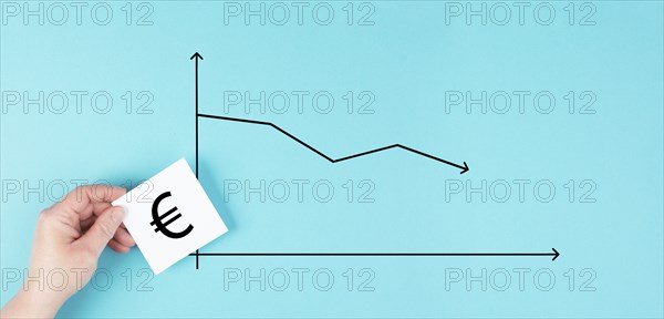 Inflation of the Euro currency, increase of prices and living costs, arrow shows down, financial and ecconomic issue