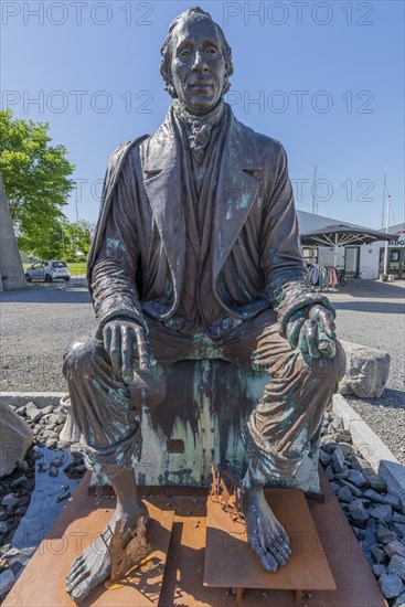 Bogense on the Kattegat, monument to the seated poet Hans Christian Andersen, fairytale figures, Fyn, island of Funen, Baltic Sea, Denmark, Europe
