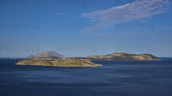 View of several islands in the blue sea under a clear sky with light clouds, Makri Island, Alimia Island, Chalki Island, Kritinia Castle, St John's Castle, Kritinia, Rhodes, Dodecanese, Greek Islands, Greece, Europe