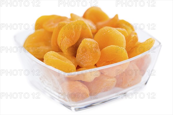 Dried Food (Apricots) isolated on white background (selective focus, close-up shot)