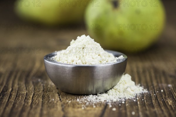 Portion of Pear powder as detailed close-up shot, selective focus