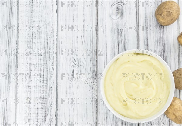 Fresh made Mash on a vintage background (close-up shot)