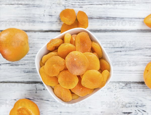 Portion of fresh Dried Apricots (close-up shot, selective focus)