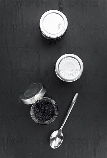 Portion of fresh Black Caviar (selective focus, close-up shot)