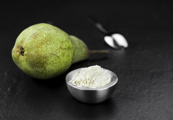 Portion of Pear powder as detailed close-up shot, selective focus