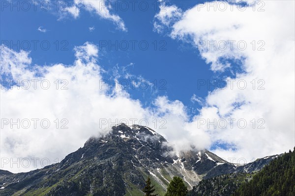 Spring clouds at the summit of Scex de Marenda, Grimentz, Val d'Anniviers, Valais Alps, Canton Valais, Switzerland, Europe