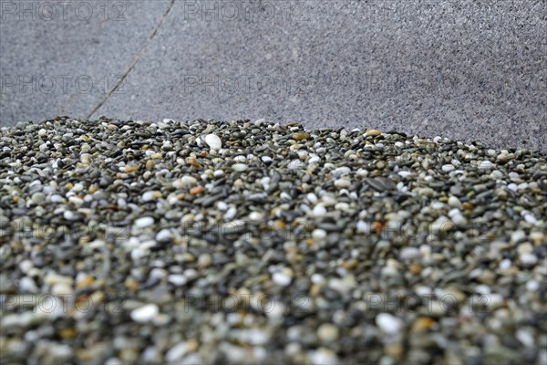 BAckground of smooth rocks found on a West Coast beach, South Island, New Zelaand