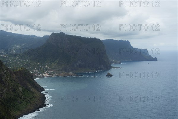 Penha d'Aguia Mountain on Cloudy Day and Ocean. Vereda do Larano. Madeira, Portugal, Europe