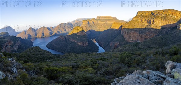 Panorama, sunset at Blyde River Canyon with Three Rondawels peak, view of canyon with Blyde River and table mountains in the evening light, canyon landscape, Panorama Route, Mpumalanga, South Africa, Africa