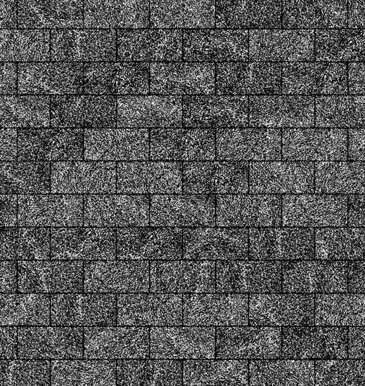Grey textured roof shingles arranged in a repetitive pattern