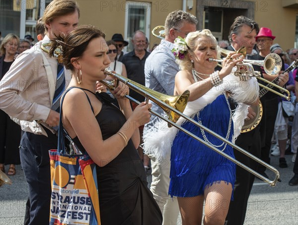 Jazz musicians, The Carling family, play on the street in Ystad in the opening of the Ystad Jazz Festival 2024, Skane County, Sweden, Scandinavia, Europe