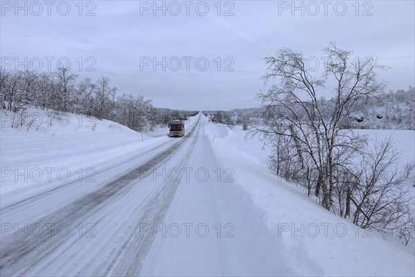By motorhome on the wintry road 92 from Inari Finland to Karasjok Norway