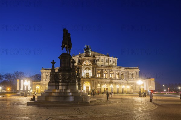 Semperoper am Theaterplatz with King Johann monument in the evening, Dresden, Saxony, Germany, Europe