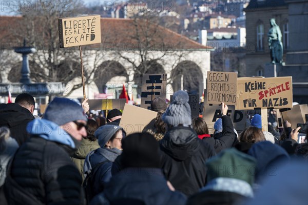 Pictures taken during the demonstration Haltung zeigen! against Nazi deportation plans of the AfD on the Schlossplatz in Stuttgart, 20.01.2024. A sign with the inscription Liberté, Egalité, FCK AFD and Gegen Rechtsextremismus and Keine Spätzle für Nazis