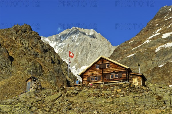 Bietschhorn hut of the Academic Alpine Club of Bern AACB, Bietschhorn summit at the rear, Lötschental, Valais, Switzerland, Europe