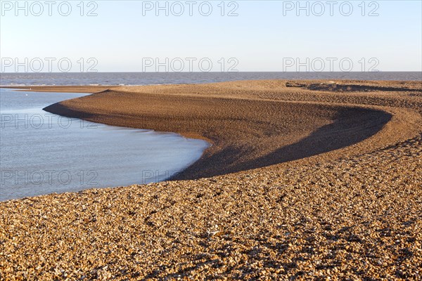 View out to North Sea from shingle beach at Shingle Street, Suffolk, England, UK