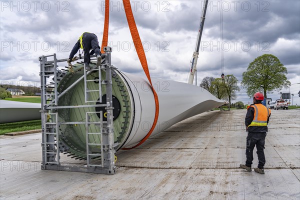Preparation for the transport of a 68 metre long blade, a wind turbine, with a self-propelled Blade-Lifter vehicle, over a 40 km long route in the Bergisches Land, through towns, villages, over country roads, narrow through roads, to the construction site of the wind turbine near Hagen, North Rhine-Westphalia, Germany, Europe