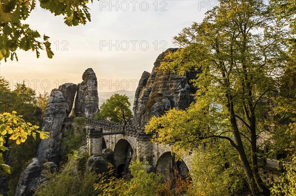 Federal Republic of Germany, Germany, Saxon Switzerland in Saxony, View of the Bastei Bridge at sunrise, Autumn, Saxon Switzerland, Saxony, Federal Republic of Germany, Europe