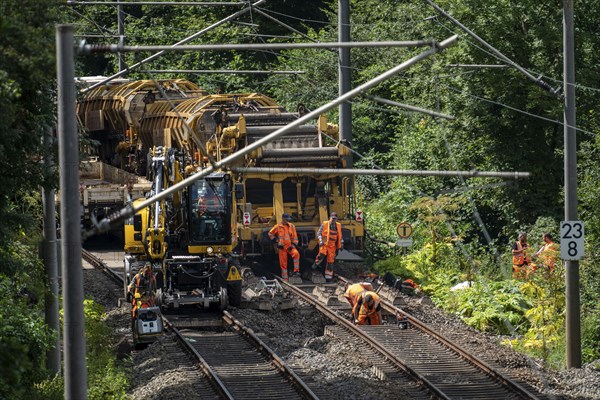 Repair work on the tracks of the S-Bahn line 9, between Essen and Wuppertal, near Essen-Kupferdreh, due to the flood in July 2020, the tracks were severely damaged by the flood of the Deilbach and further along the course of the Ruhr, repair work, North Rhine-Westphalia, Germany, Europe