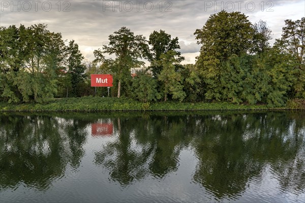 The Rhine-Herne Canal in Gelsenkrichen, art project Bilder am Kanal, courage, panel no. 9/15, opposite the Bismarck harbour, project of the Kulturkanal, part of the Capital of Culture RUHR.2010, North Rhine-Westphalia, Germany, Europe