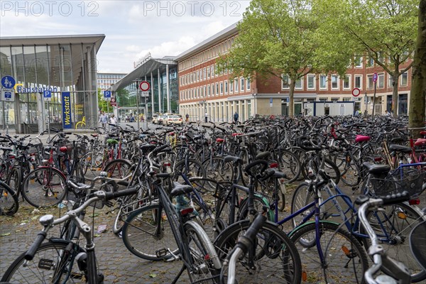 Large bicycle car park in front of the main railway station in Münster, North Rhine-Westphalia, Germany, Europe