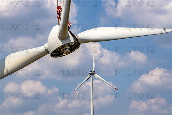 Repowering of a wind farm near Issum, 9 older wind turbines from the manufacturer Enercon (model series E-58) will be dismantled, which have been in operation for over two decades, will be replaced by a total of four Enercon E-160 turbines, under construction, with a total output of 22 megawatts, Lower Rhine, North Rhine-Westphalia, Germany, Europe
