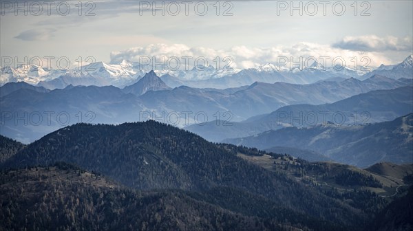 View of the Alpine foothills and main Alpine ridge with snow-covered peaks of the Zillertal Alps, from the Austrian Schinder, Bavarian Alps, Mangfall mountains, Bavaria, Germany, Europe