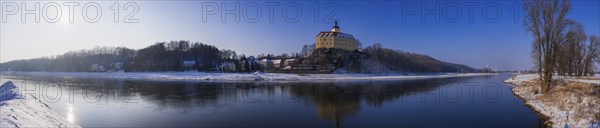 Hirschstein Castle, also known as Neuhirschstein, is a castle in the municipality of Hirschstein in the district of Meißen that grew out of a medieval castle It rises imposingly on a 25-metre-high cliff on the left bank of the Elbe opposite Neuseußlitz