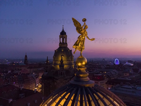 Dresden's old town from above.The glass dome of the Academy of Arts, crowned by a Fama figure, under which there is an exhibition room, called a lemon squeezer after its shape