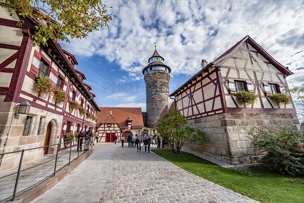 Imperial castle with fountain house and Sinwelt tower, half-timbered houses in the castle, in autumn, Nuremberg, Middle Franconia, Bavaria, Germany, Europe