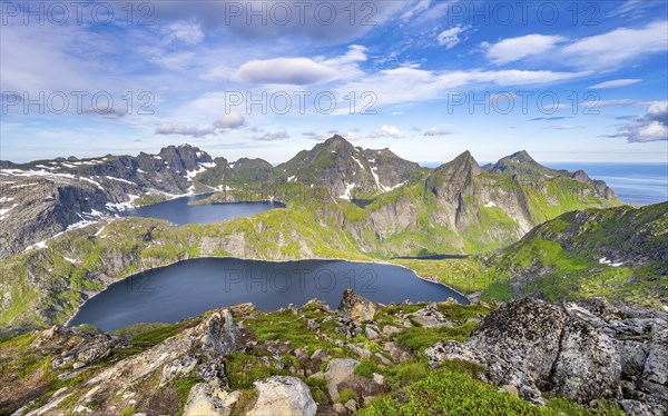 Mountain landscape with steep rocky peaks and lake Tennesvatnet and Krokvatnet, Hermannsdalstinden peak in the back, Moskenesoya, Lofoten, Nordland, Norway, Europe
