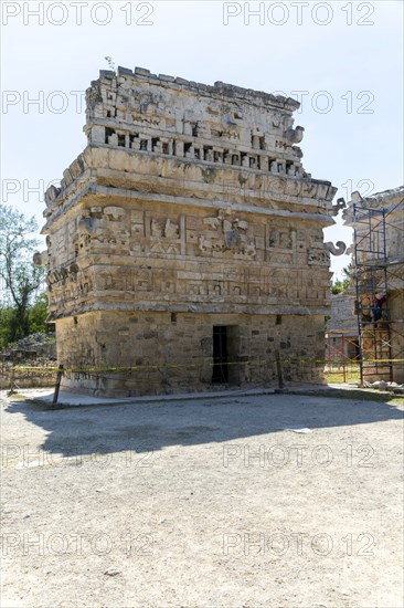 Elaborate decorated stone facade in Monjas complex, Chichen Itza, Mayan ruins, Yucatan, Mexico, Iglesia or church building, Central America