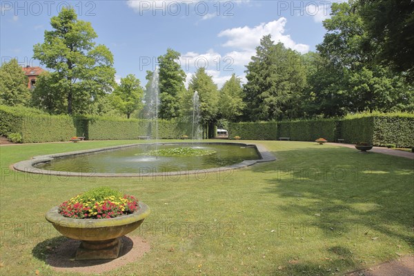 Fountain with flower decoration in the baroque garden, garden art, castle, Lichtenwalde, Niederwiesa, Saxony, Germany, Europe