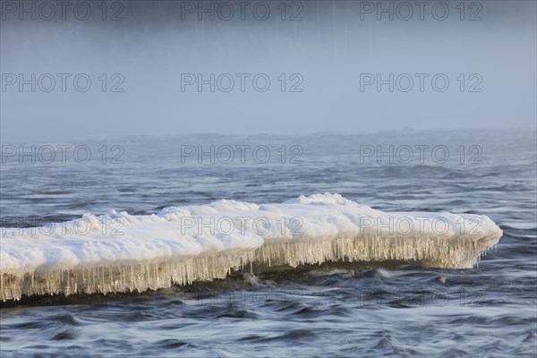 Icicles on the Torne älv River, Lapland, Finland, Europe