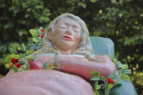 Fairy tale figure Sleeping Beauty, fairy tale, resting, sleeping, sleep, lying, pink, detail, head, face, castle park, castle, Lichtenwalde, Niederwiesa, Saxony, Germany, Europe