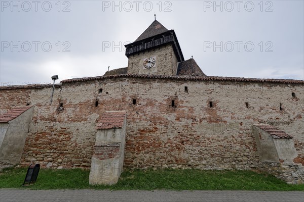 The fortified church of Frauendorf, Biserica Fortificata, in Transylvania. The church is a fortified church, which was surrounded by a wall like a fortress for defensive purposes. Frauendorf, Transylvania, Transylvania, Romania, Southeast Europe, Europe
