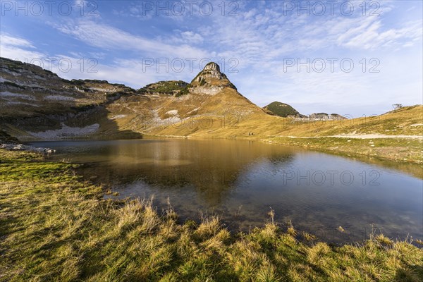 Lake Augstsee and the Atterkogel mountain on the Loser. Autumn, good weather, blue sky. Reflection. Altaussee, Bad Aussee, Ausseer Land, Totes Gebirge, Styria, Upper Austria, Austria, Europe